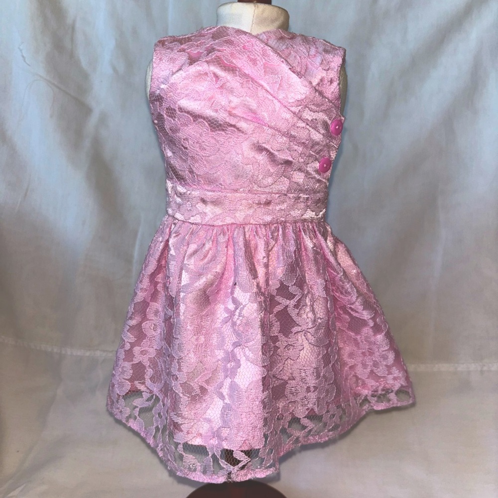Pretty in pink is constructed with satin lining and lace overlay